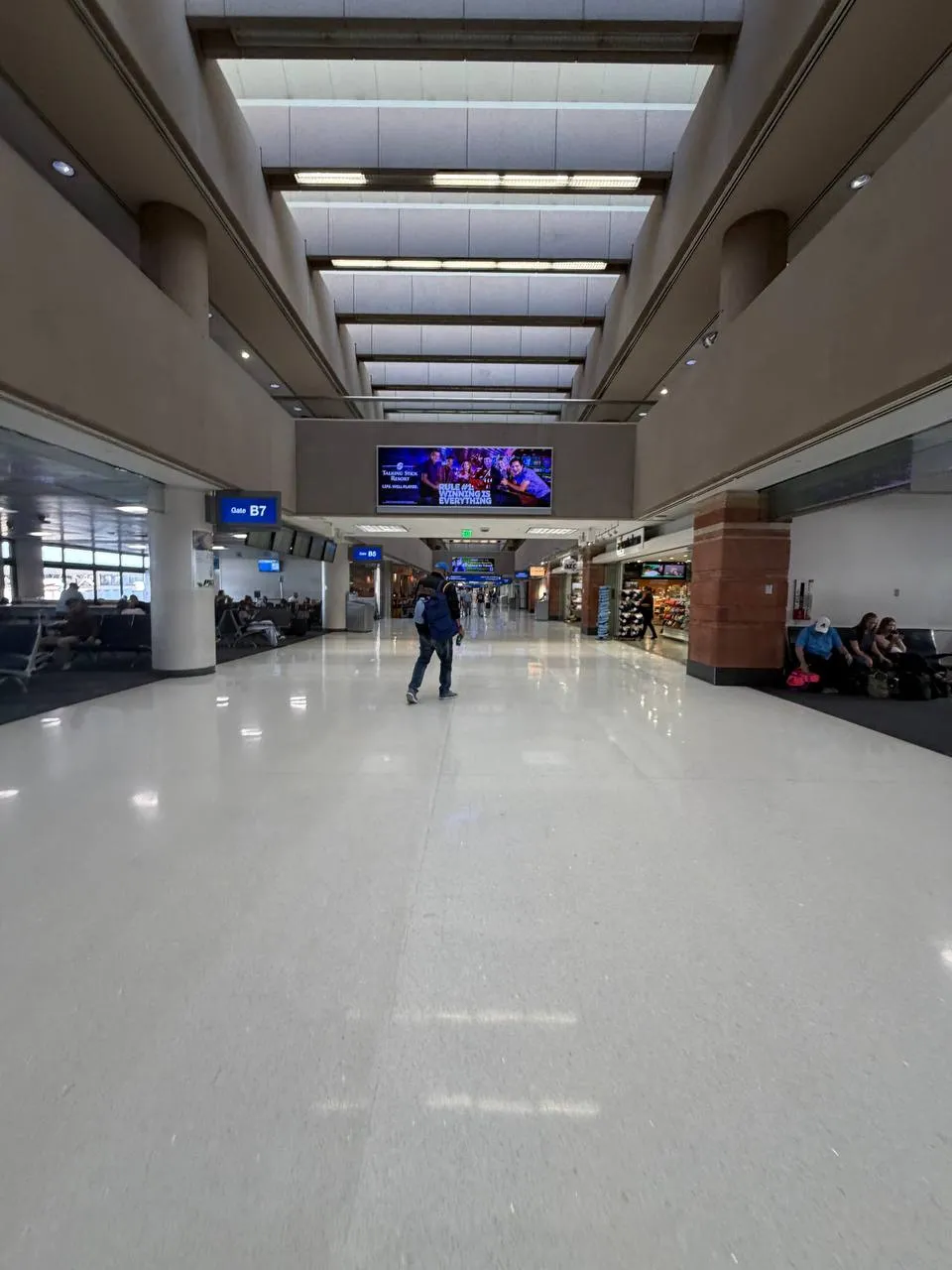 Gate B7 — empty terminal, early morning. Everyone else was doomscrolling.